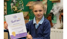 Pupil has 12 inch trim for charity